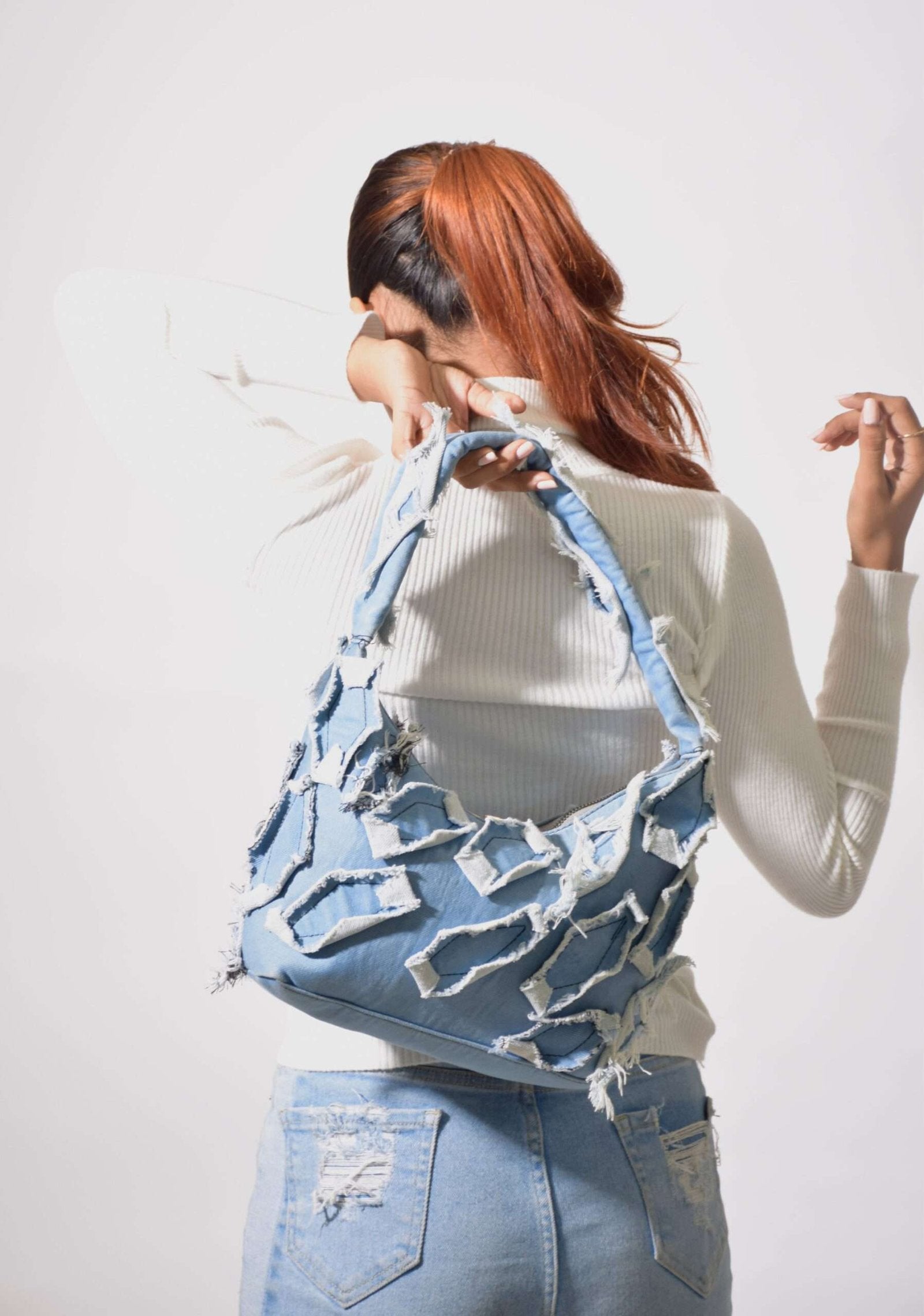 Distressed sky bag