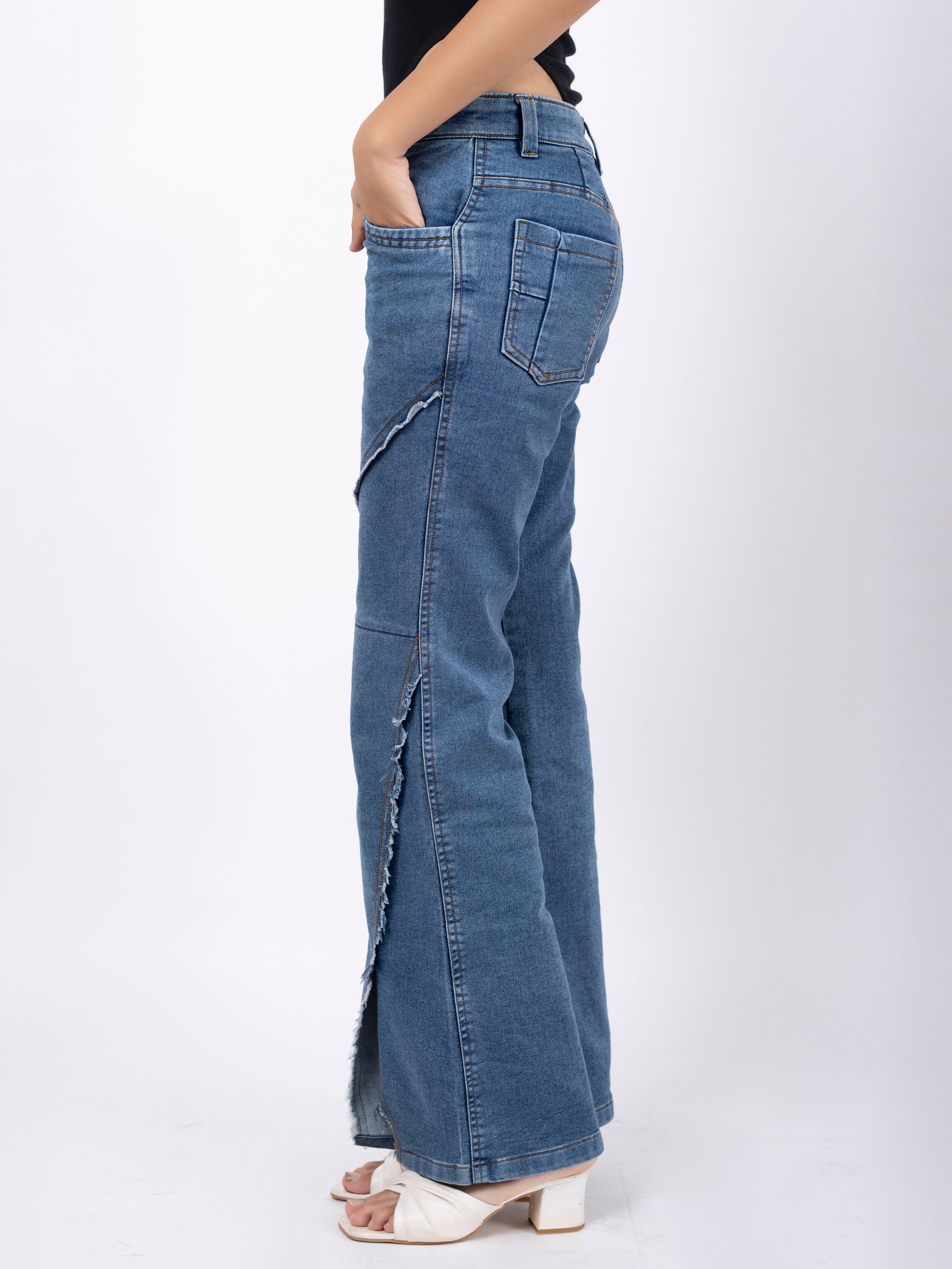 Disstressed Flared Denim Jeans